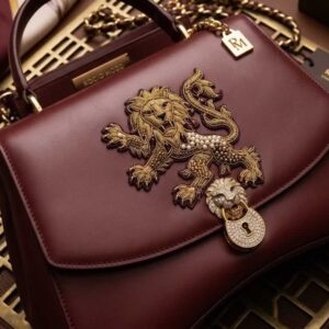 Bolso "León Imperial" en Piel Burdeos con Broche Joya y Pedrería